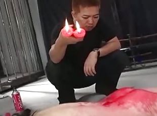 Red candle drips are all over this Japanese's ass