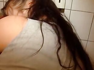 Cute Brunette Blows a Hot Cock on the Toilet