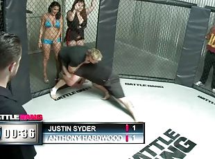 A sporty babe gets fucked hard in the middle of a cage fighting cage