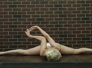 Fit blonde teen can bend her body in amazing ways