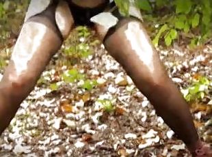 An autumn afternoon, my friend pissing in a public forest