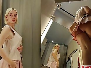 Trying on transparent clothes without panties. Web camera in the fitting room