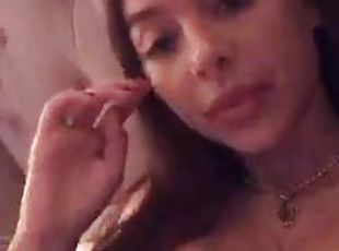 Busty woman on bed