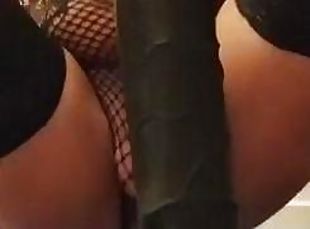 CD in black lingerie fucks extreme black dildo