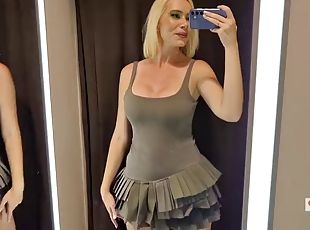 Trying on completely transparent clothes in the fitting room. Look at my boobs in a public place