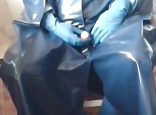 Cock play in blue rain cape