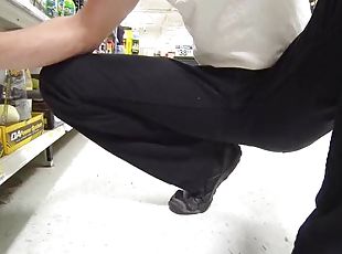Covertly pissing black jeans in public