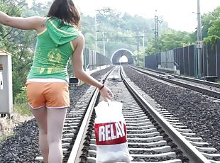 Teen roams the railroad tracks until she finds a place to play