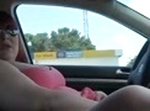 Obese skank wearing glasses rubs her twat in a car