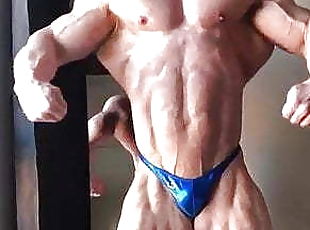 BODYBUILDER&#039;S SHINY BLUE POSERS