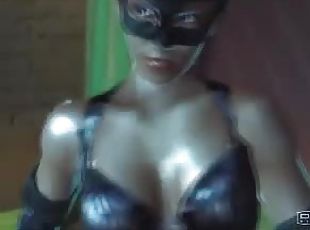 Sexy 3D Catwoman demonstrates her perfect body indoors