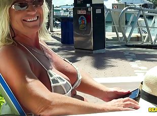 Horny milf with in a bikini fucks hard on a luxurious yacht