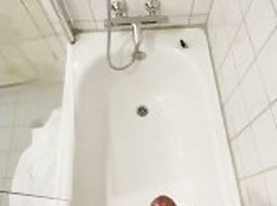 Huge cumshot in bathtub