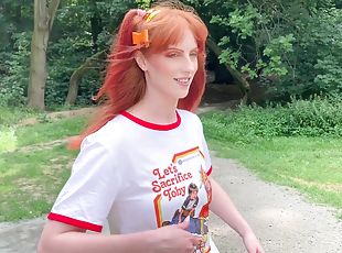 Redhead teen Alex Harper with pigtails does a photoshoot in the woods