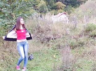 Long haired teen fingering her bald snatch outdoors