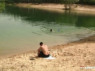 A couple goes for a swim then fucks in the sand on the beach