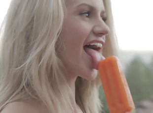 Beauty sucks a popsicle nude