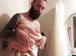 Dirty tattooed pervert wanks cock in the bathroom while doing laundry