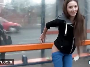 Beautiful girl has fun playing in public