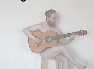 DJ Phuzzy plays guitar naked