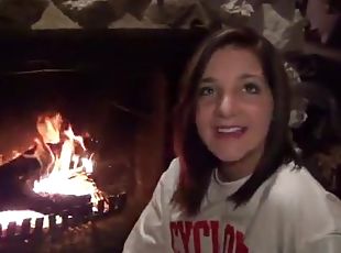 Teenager in front of fireplace has tight body