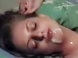 Cumshot drips off her chin