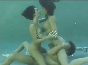 Underwater sex with two hot brunettes