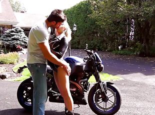 Biker chick Vyxen Steel bends over for a swollen prick