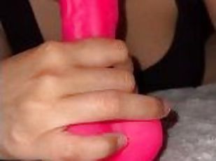 Sexy,girl,sucks,on,pink,toy